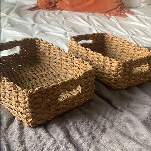 2 wicker storage baskets